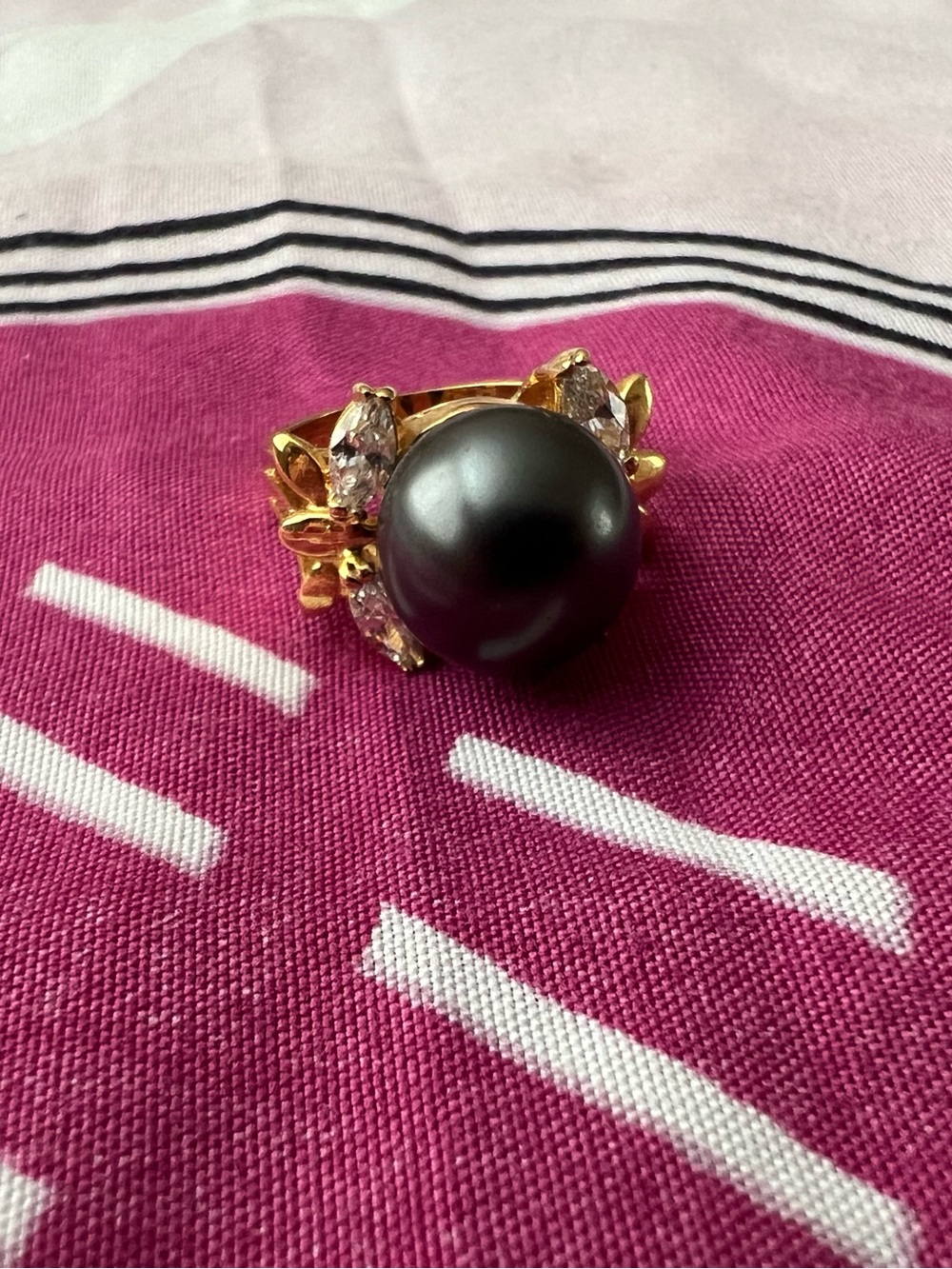 Gold-Tone Ring with Black Pearl Accent and Clear Crystal Details